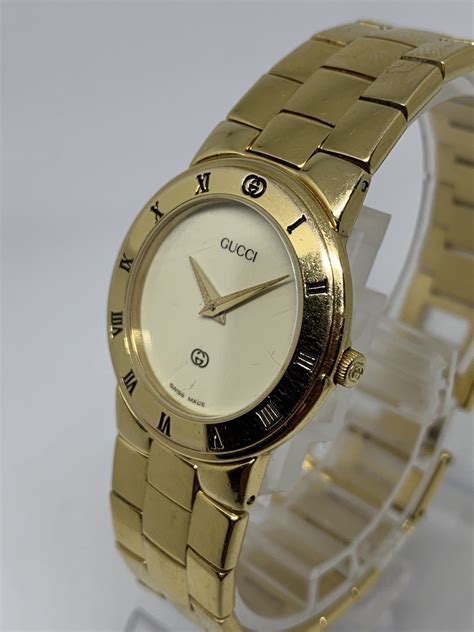 gucci watch gold vintage.